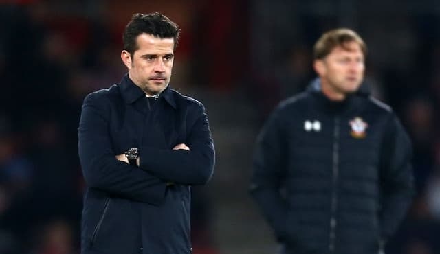 marco silva manager of everton looks dejected as ralph hasenhuet